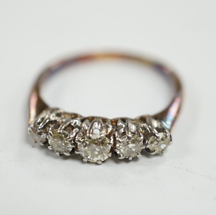 An 18ct and graduated five stone diamond set half hoop ring, size L, gross weight 2.8 grams. Condition - poor to fair